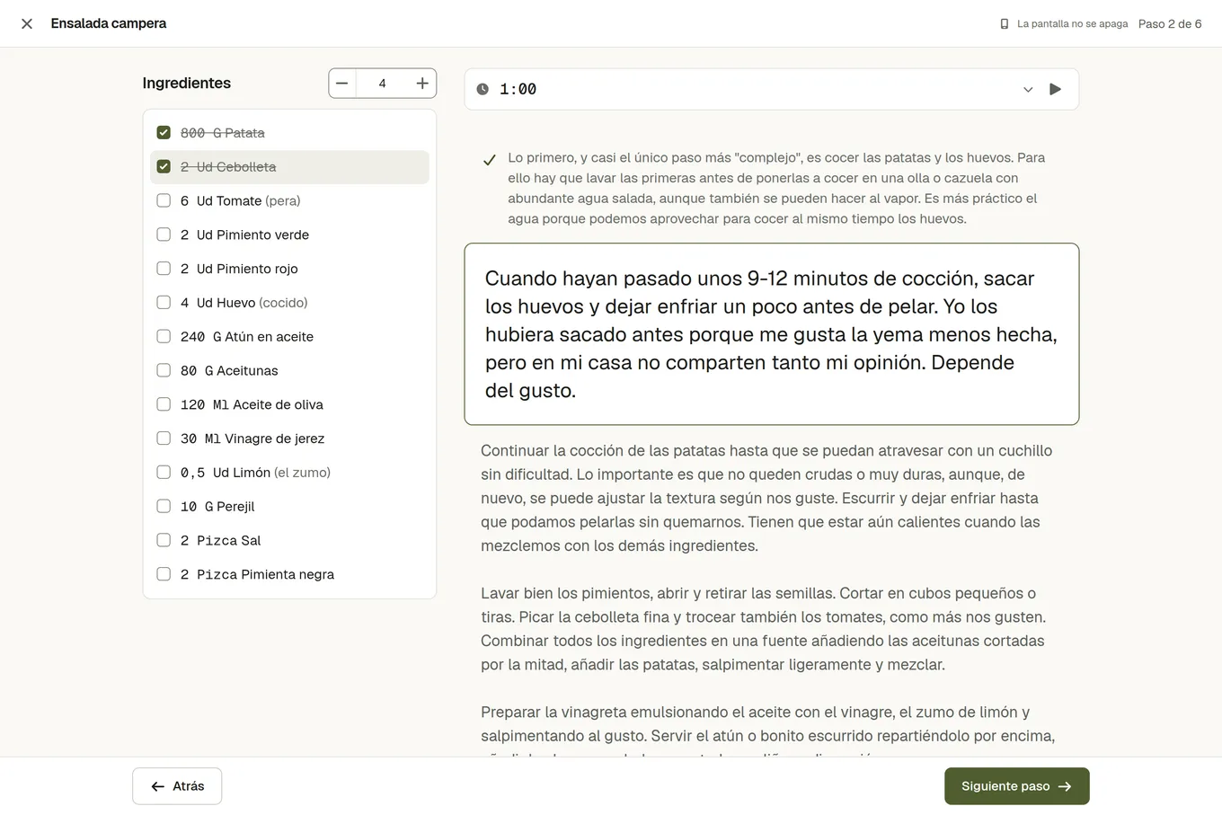 El modo cocina: el paso actual en grande, Atrás y Siguiente paso debajo, y la lista de ingredientes al lado con algunos tachados